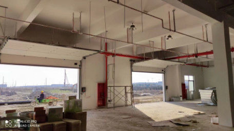 شراء أبواب المرآب المقطوعة مع الفولاذ المغلف من أجل القوة والمتانة online manufacture