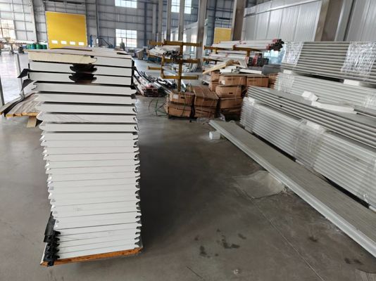 تخصيص RAL9002 أبواب المرآب القطاعية مع آلة الإنسان وواجهة صندوق التحكم